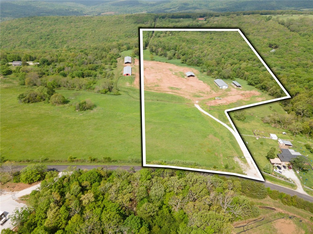 Escape to serenity with this breathtaking 27 MOL parcel of pristine rural land, ideal for starting your homestead or building a custom home. Nestled in the heart of West Fork, this property boasts rolling hills, fertile soil, and sweeping views of natural beauty. Surrounded by mature trees and open meadows, it’s a haven for those seeking peace, privacy, and a connection to nature. Whether you envision a self-sufficient homestead with sprawling gardens and livestock or a cozy countryside home with room to roam, this land offers endless possibilities. Embrace the freedom to create your ideal lifestyle in a tranquil, rural setting.
