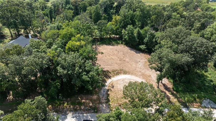 PRICE IMPROVED! This 3.3-acre building lot offers a great opportunity to create your ideal home. With water and electricity already on the property and a perc test approved for 5 people, it's ready to go. The private road and gate provide added privacy and security, making this a perfect spot for a peaceful retreat while still being close to amenities.