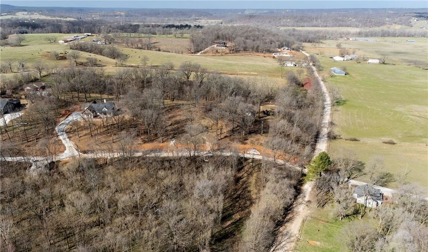 This 3.3-acre building lot offers a great opportunity to create your ideal home. With water and electricity already on the property and a perc test approved for 5 people, it's ready to go. The private road and gate provide added privacy and security, making this a perfect spot for a peaceful retreat while still being close to amenities.