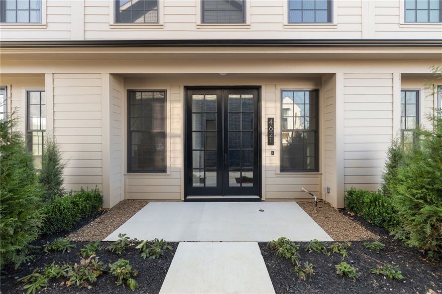 Elevated living in the heart of Rogers. This stunning 3-bedroom townhouse combines luxury, convenience, and modern design—all within walking distance to Walmart AMP, Topgolf, the Razorback Greenway, and Pinnacle Hills Promenade. Featuring high-end finishes throughout, this home showcases rich hardwood floors, designer lighting, and an open-concept layout that blends style with functionality. The kitchen offers quartz countertops, stainless steel appliances, a gas range, and premium cabinetry, creating the perfect space for entertaining or everyday living. Upstairs, spacious bedrooms provide comfort and privacy, while thoughtfully designed baths highlight elevated materials and craftsmanship. A two-car garage and low-maintenance exterior make this the ideal home for those seeking both convenience and upscale living. With its premium location and luxury finishes, this townhome delivers the ultimate Rogers lifestyle—walkable, modern, and effortlessly stylish.