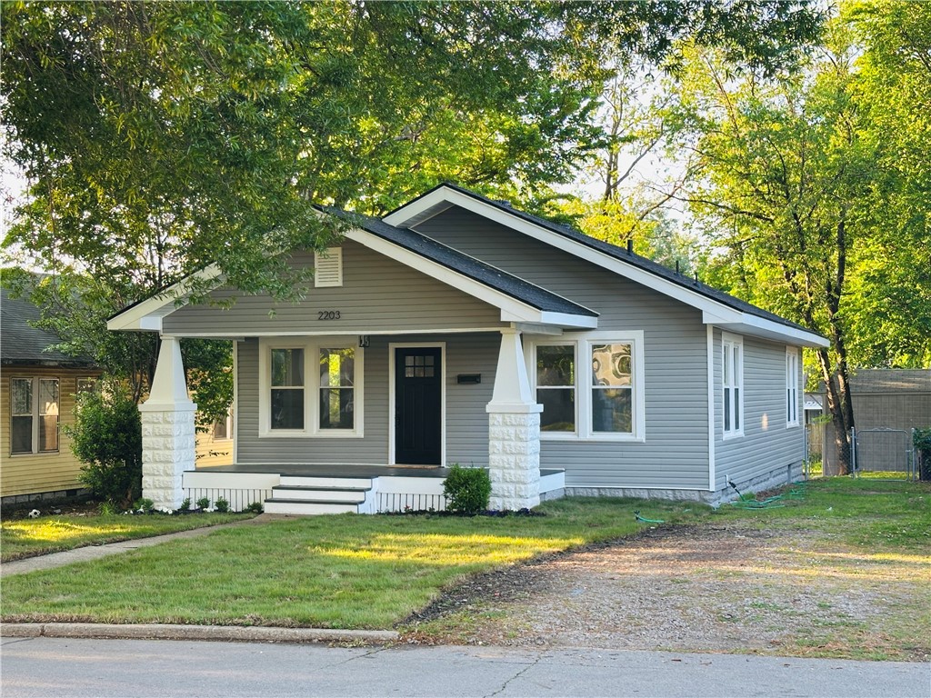 Welcome to this beautifully updated three-bedroom, one-bath home that blends modern upgrades with cozy charm. Step inside to find brand-new updates throughout. Luxury vinyl plank flooring, fresh paint, updated plumbing electrical fixtures, sleek faucets, and new doors! The remodeled kitchen boasts new quartz countertops, a stylish tile backsplash, a new stove and dishwasher. Giving this space an inviting and cozy flow. The bathroom also has been tastefully renovated. Additional highlights include a pull-down attic for convenient storage, new roof, vinyl windows, and low-maintenance vinyl siding for worry-free living. The home has also been structurally reinforced with new piers and foundation leveling, complete with a transferable warranty for peace of mind. Outside, enjoy gorgeous curb appeal with freshly laid sod, mature trees, landscaped beds, and a welcoming entrance sidewalk that enhances the home's cheerful and serene mood. Schedule your showing today!