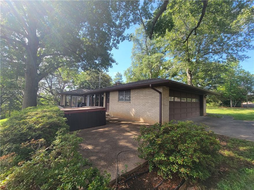 780 Feet of lake frontage (Approx).   2 boat slips. 3 car garage detached outbuilding. Amazing views. Very unique setting.