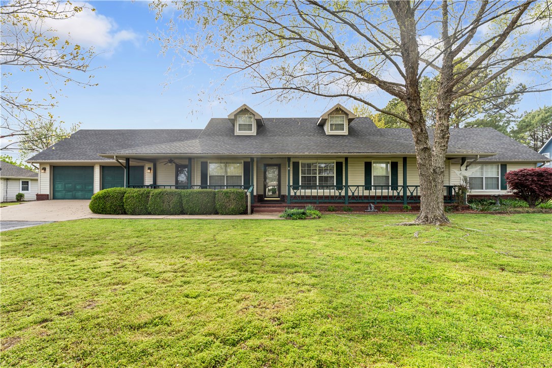 3 bed, 2.5 bath home with 1,912 sq ft, built in 1997 and move-in ready. Spacious 1.5-acre lot includes a storage shed and large shop—both with electricity. Located on expanding Hwy 112 in the heart of NWA, offering excellent accessibility and investment potential. Rare opportunity for space and location combined.
