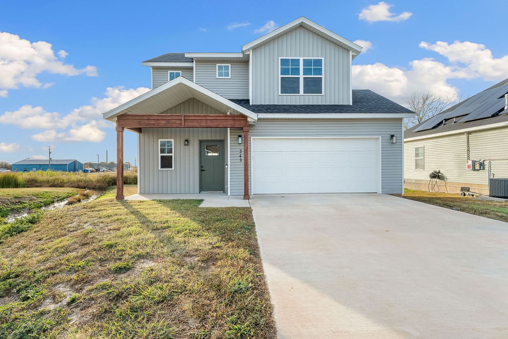 Welcome to Phillip's Park! Beautiful quality New Craftsman style homes in the center of it all in Gentry; close to Gentry Schools, City Park, and Gentry Splash Pad. The home features 3 bedrooms, 2 full bathrooms, walk in closets, linear gas fireplace, large laundry room, fenced in backyard and covered porch. Complete with vinyl siding, brick, and double pane windows for energy efficiency and curb appeal.