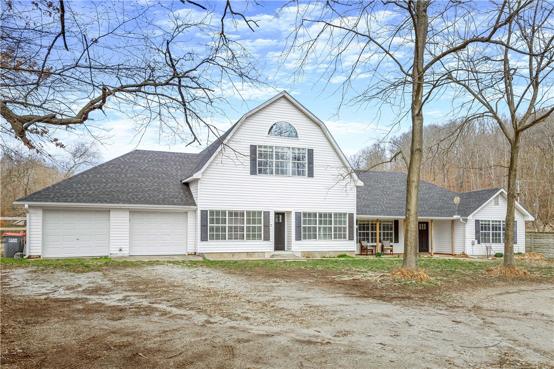 Close to bike trails. Close to downtown Bentonville square. Only minutes from i49. Right beside the Format music festival grounds. This location is convenient while still giving a peaceful country feel. This barn and milking house were turned into a single family residence in 1994 and today it is loaded with upgrades like wood look tile floors, new appliances, new cabinets, granite, new light fixtures, showers, toilets, paint, WiFi thermostats, and so much more. The flat lot is nearly an acre and awaiting spring to bring wonderful colors to the landscape. The home could easily be set up for two families if desired with its 3 en suite master bedrooms, multiple laundry rooms, and multiple living areas. Additionally a second kitchen could be added easily to the existing plumbing. This is a great opportunity for multi generational or large families. In Bentonville school district. The roof and HVAC were new in 2020. A $4500 well water purification system installed by Culligan. Also has RV hookup. Come see today!