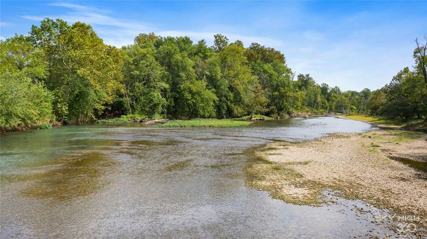 This 200 acre property has something for everyone! Illinois River flows through for great fishing & kayaking. Great bottom land pasture for cutting hay, running cattle or horses (currently set up for cutting hay & cattle) Woods for hunting, exploring & ATV riding. Portion of the river side property is in the flood plain, however, there is still plenty of land outside of the flood plain to build on. Nice building sites with potential of river valley views on the wooded side, additional access to the upper part from Gary Turner Rd. Seller says property has not been logged for 70+ years. Older 970 SF house on the property could be refurbished and used for guest house or weekend get-away (needs extensive work - roof replaced approx 10yrs ago). Kayak/float from the property 2.8 miles downstream to the new Kayak Park or continue on for a leisurely day of floating/kayaking for another 3 miles to the Hwy 59 bridge.  Close to town - only 3 miles from City Limits.  30 minutes from Fayetteville or Springdale.