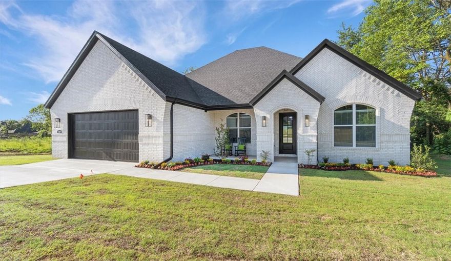 The picturesque Princeton 4 plan in Hughmount, located in Fayetteville, Arkansas! The Princeton 4 plan has 2424 square feet, with 4 bedrooms, 3 baths and a flex space/study.  These brand-new homes boast 4-sided brick and LVP flooring. Fantastic front porch with a sitting area. Upon entrance, there is a flex space / study and a spacious living area featuring a gas fireplace with a poplar mantle. The kitchen will have 42-inch cabinets, lovely appliances and quartz countertops and tile backsplash.  The Primary bedroom has a fabulous en suite, dual sinks,  with a walk-in shower with tiled walls and a soaking tub!  These homes feature LED lighting throughout, and a high efficiency AC with programmable Wi-Fi thermostat. Come find your dream home today! Taxes and Parcel TBD. Garage Door Opener!