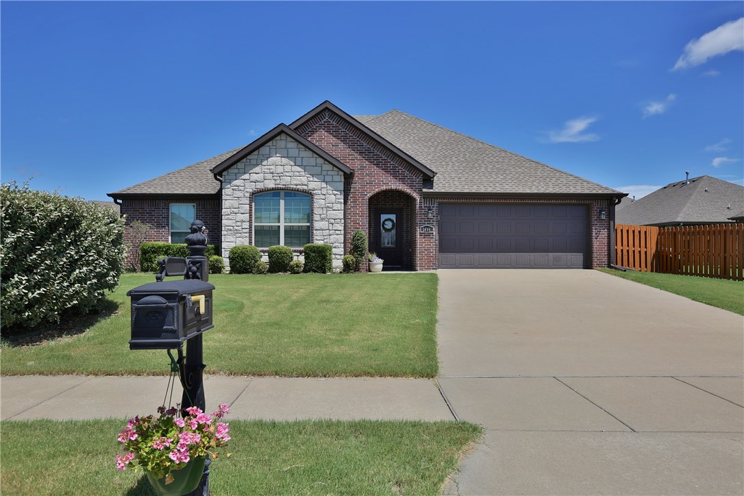 Beautiful home in an ideal location, minutes from the Walmart home office. This 3bd, 2ba home sits on a quiet street on a 0.28-acre corner lot with a partially covered patio and a huge backyard, perfect for entertaining. This home features an open concept kitchen with granite counters and living room with hardwood floors and crown molding designed to make you feel welcome from the moment you walk in the door. The master suite includes a walk-in shower, double sinks and a whirlpool tub with 2 walk-in closets. All brick exterior, Nest thermostat, security features, storm shelter in the garage, and privacy fence makes this a great home that you must see.
Walking distance to Elm Tree Elementary School and close to shopping, trails, restaurants, groceries, and the Bentonville square.