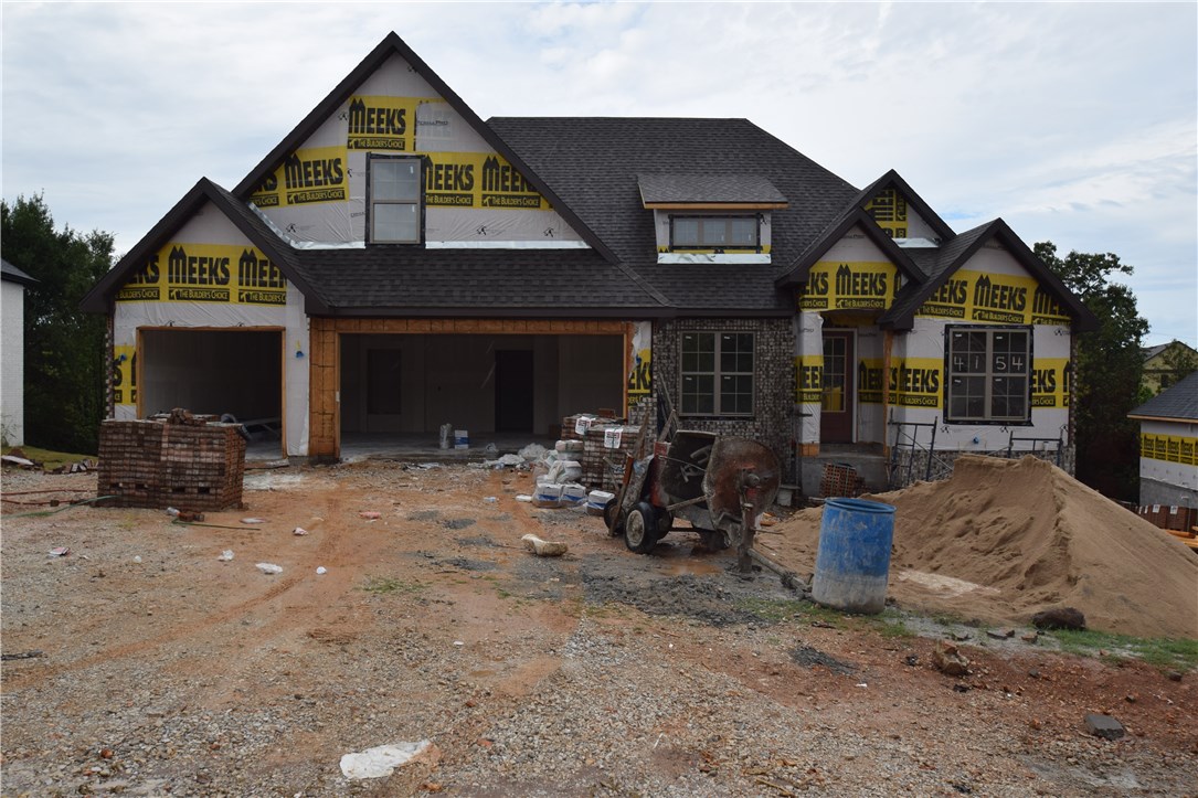 Fantastic new construction home in Legendary Subdivision nestled at the end of a private culdesac with a private, tree-lined back yard. This plan touts 2 beds, 2 baths & formal study on main level, 2 beds & a full bath upstairs. Finishes will include granite counters, stainless appliances, faux-wood tile flooring throughout, jetted tub & tile shower in master, gas fireplace & much more! You'll also love the oversized covered patio, community pool & clubhouse! Get in now and choose the remaining finishes!