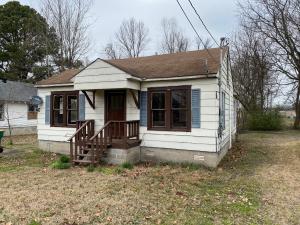 Cute frame house with hardwood floors, a little TLC and it can be your Home.