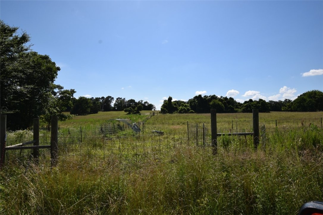20.71 Acres Near Lincoln – Prime Meadowland with Utilities! Escape to the quiet life on this beautiful 20.71-acre tract just outside Lincoln! Located only 20 miles from Fayetteville, this property offers a great homesite with electric and water available at the road. The land features good heavy meadow—perfect for grazing, hay production, or future development. Paved county road access, cheap taxes, and a peaceful setting make this an ideal place to build or invest. Great hunting in the area adds to the appeal. Don’t miss out on this rare opportunity for usable acreage in a prime location! Additional 1.45 acres available.