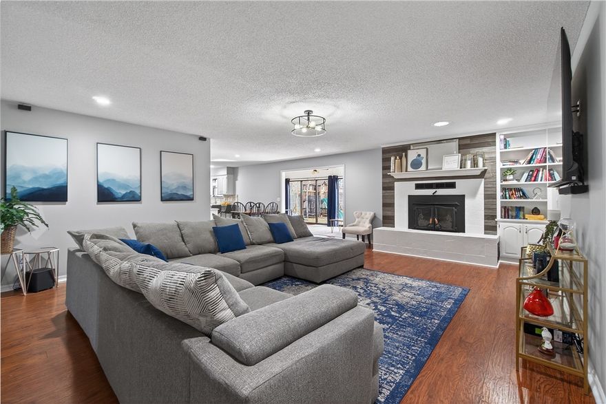 Less than one mile from OZ Trail Bike Park, this home is the ideal location for mountain bikers, short-term rental investors, or anyone looking to purchase a home in a convenient location here in Bella Vista. Not only located near the top of the OZ Trail lift, but also less than a mile to Hwy 71. This homes large sunroom fills the space with natural light. The sunroom overlooks the flat backyard and wooded area behind the property. All bedrooms have large walk-in closets. The garage is oversized, large enough to fit your fishing boat or a workshop space. The garage also has a side door that leads out to the backyard. Each room of this home is spacious, including your laundry room and the unfinished basement which provides 340 square feet of storage. When winter rolls back around the wood burning stove (hard to find this feature) will keep you warm. Come enjoy your morning coffee in the sunroom before you head out to OZ Trails for a day of fun!