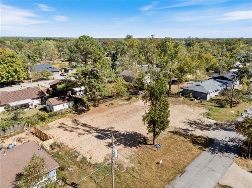 RARE FIND — as close as it gets to Downtown Bentonville! Cleared and ready for your dream home. Enjoy the best of Bentonville living with easy access to Downtown restaurants, Farmers Market, First Fridays, and the beautiful Crystal Bridges trails. Bike or walk to all your favorite spots! Don’t miss this opportunity to own a buildable lot in one of the most desirable areas of Bentonville — this one won’t last long!