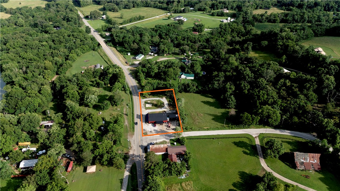 Located just a few miles south of Elkins is this commercial building with potential for a multitude of uses. This building has been extensively remodeled and currently serves as a turn key butcher shop. All the necessary equipment is in place to continue operating such as hanging room, holding pens, freezer for finished product, stainless steel tables, band saw, commercial grinder, commercial vacuum sealer, and a two compartment large stainless sink. The building has 4,100 +/- sq ft of heated/cooled area. This property has been a successful general store in the past as well and this is due in large part to its location. The property has HWY 16 road frontage and is less than 25 minutes to Interstate 49 in Fayetteville. This stretch of HWY16 has great visibility and a good daily traffic count. 5 minutes to Elkins and only a stones throw to the White River. The possibilities are endless so don’t miss this opportunity to become a business owner in this fast growing area!