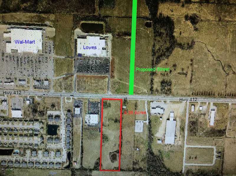 LOCATED ON HWY 412 JUST EAST OF THE WAL-MART SUPER CENTER. EXCELLENT LOCATED FOR DEVELOPMENT. SELLER RESERVES RIGHT TO REFUSE OFFER ON A SIZE CASE-BY-CASE BASIS.