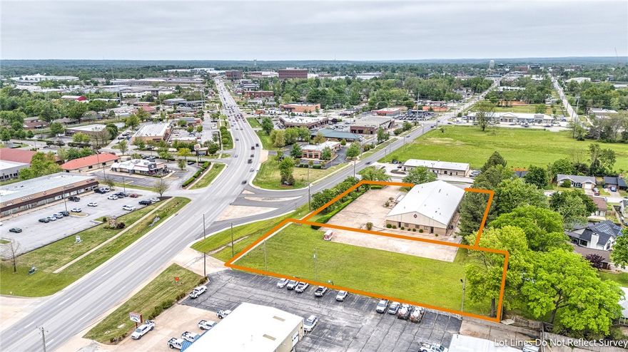 Prime commercial property located at one of Bentonville’s most visible and active interchanges: SW A Street and S Walton Blvd. Offering unmatched exposure in a highly desirable corridor, this 10,209 square foot office building is just one mile from downtown Bentonville. This listing includes two parcels totaling 1.92 acres. The 1.09-acre parcel includes a steel frame building, while the adjacent 0.83-acre lot allows for flexibility to expand your footprint or additional development. Whether you’re planning retail, office, mixed-use, or something entirely unique, this site offers rare potential in a fast-growing area surrounded by strong businesses and ongoing development. Opportunities like this are becoming harder to find in Bentonville—don’t miss your chance to create something standout in a city that continues to grow and thrive.