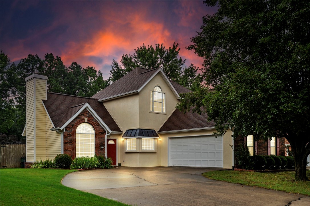 If you enjoy nature and want easy access to biking and walking trails, you've found the perfect home! Nestled in a desirable East Fayetteville neighborhood, it offers a quiet, low-traffic setting; at the same time being conveniently close to top-rated schools, shopping, dining, parks, and golf courses. This well-maintained home blends comfort and practicality, featuring wood flooring throughout. The inviting kitchen includes double ovens and abundant rich wood cabinetry, while the living room boasts high ceilings and plenty of natural light. The primary suite is conveniently located on the main floor. Plenty of storage to be found! Big closets in all 3 bedrooms (2 walk-in). Linen closet in laundry, and more storage beneath stairs. Step outside to a private, serene backyard—perfect for relaxing or entertaining. Outdoor enthusiasts will love the direct access to Mud Creek Trail and nearby paved walking and biking paths. New roof 2021. New garage door opener installed July 2025. All appliances convey.