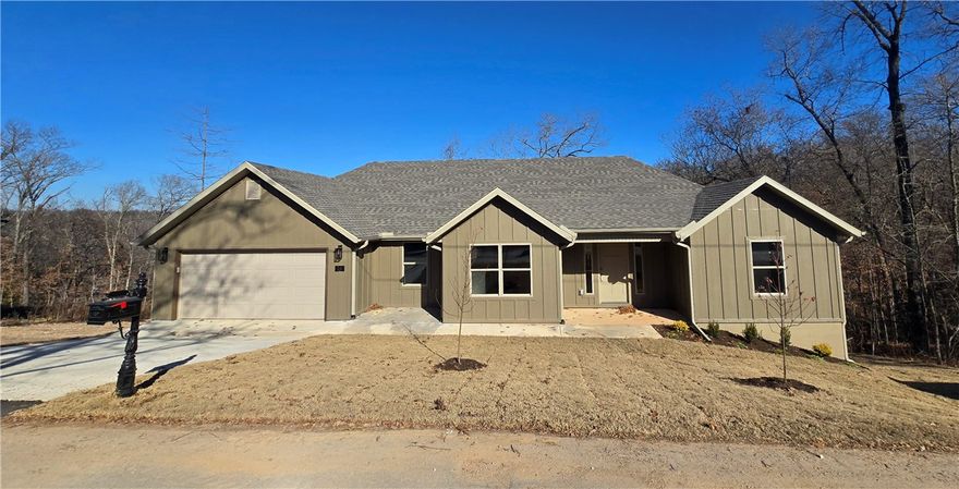 New Construction Near Lake Ann in Bella Vista!

Beautiful one-level home featuring 3 bedrooms with walk-in closets, 2 bathrooms, and spacious open-concept living areas. The kitchen offers a large pantry, 3cm stone countertops, and a Frigidaire Gallery appliance package—perfect for both cooking and entertaining.

Enjoy the outdoors on the spacious back patio, and take advantage of the 2-car garage for added convenience. Located in a peaceful area near Lake Ann, this home provides a tranquil setting while being just a short drive to all that Northwest Arkansas has to offer—bike trails, golfing, lakes, shopping, business offices, and more!

Zoned for Bentonville Schools!