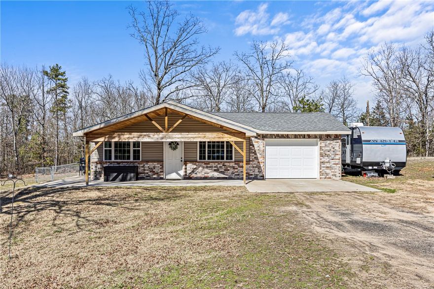 Discover the perfect blend of privacy and convenience with this beautifully remodeled 3-bedroom, 2-bath home nestled on 2 acres. Tucked away for seclusion, yet just minutes from Russellville's top restaurants, clinics, and amenities, this home offers the best of both worlds.  Step inside to find modern updates throughout, featuring a spacious layout, stylish finishes, and plenty of natural light. Whether you're looking for a peaceful retreat or a place to entertain, this property is ready to be your next home. Don't miss out on this rare opportunity--schedule your showing today!