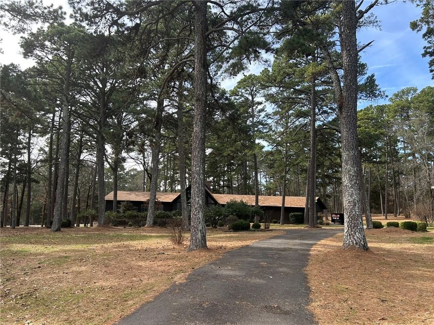 Tucked away on approximately 4 acres in Russellville, this spacious 2-bedroom, 2.5-bath home offers the perfect blend of privacy and convenience. With 2,800 square feet of living space, there’s room to spread out, entertain, and truly enjoy country-style living just minutes from town.

Inside, you’ll find generously sized rooms, ample natural light, and a flexible layout that offers endless possibilities. Each bedroom features its own private bath, with an additional half bath for guests. The expansive living areas provide space for both everyday comfort and hosting family and friends.

Outside, the property continues to impress with a 2-car garage plus a 3-car carport — ideal for extra vehicles, recreational toys, boats, or workshop space. The 4-acre setting offers privacy, room to roam, and potential for gardening, outdoor entertaining, or simply enjoying the peaceful surroundings.