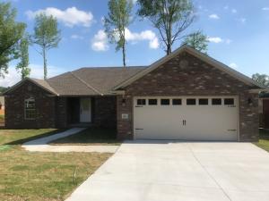 NEW AND READY FOR YOU--EFFICIENCY AND DESIGN IN MIND in this new 3 BR, 2 BA brick home with hardwood flooring throughout and granite countertops in kitchen and bathrooms. Just over 1600 sq. ft., this split floor plan features a master suite with a well-designed master bath--whirlpool tub, walk-in shower, separate toilet, large walk-in closet and a linen closet! Check this one out today!
