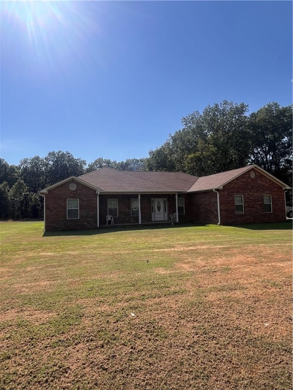 Charming Country Home built in 2009 on 2.67 Acres. Discover peaceful country living in this beautiful 3 Bedroom, 2 Bath, Office and extra living area all situated on the nice size lot on minutes from town. The home is all electric and has barely been lived in the short time it has been built. Features include Custom Wood Cabinets, Trey Celing, Crown Molding with Chair railing and full Kitchen eat at Island. Home features a transferable Foundation Warranty from Oshan for peace of mind. Enjoy relaxing on the back patio and experience the tranquility of country living. Don't miss out on this gem