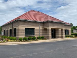This free standing building is located in dense medical and professional office area of West Russellville along Hwy 64 (W Main). The property is directly across from Walgreens and just a block away from Millard Henry Clinic. Situated on a 1.37 acre corner lot this property is perfect for financial institution, medical space, professional office or retail space. Constructed in 2005 the interior of the building currently has lobby area, teller area, private offices, conference room and break area. Current site has 23 parking spaces and sees approx. 20,000+/- vehicles per day in last traffic count. Property also has attached 880 sq foot drive through canopy.