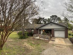 Welcome to this 3-bedroom, 1.5-bath brick home, offering solid bones and endless potential! Featuring a one-car garage and a fully fenced backyard, this home is perfect for those looking for a little extra space and privacy.Inside, you'll find a functional layout with plenty of natural light. While some paint and flooring updates could enhance its charm, this home is a great opportunity for buyers looking to add their personal touch.Located in a desirable neighborhood, close to schools, shopping, and parks, this home is a fantastic investment or starter home. Don't miss your chance--schedule a showing today! SEE AGENT REMARKS
