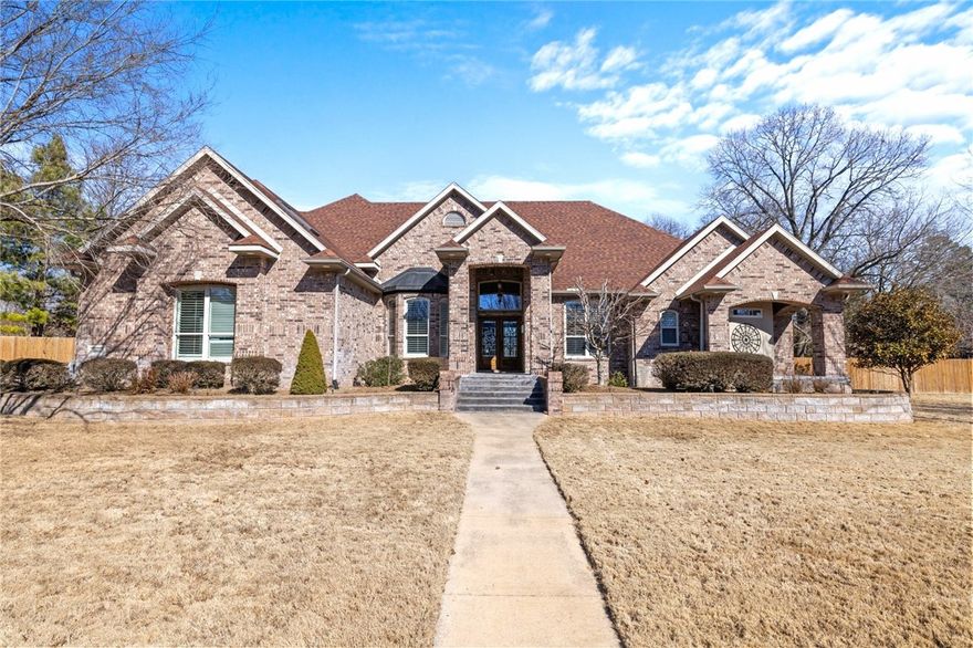 Welcome to the gated Avalon community in walking distance to Horseshoe Bend Marina. Enjoy seasonal lake views from this 4 bedroom, 3.5 bath house on over an acre with a workshop and heated, saltwater pool. This home features 3 bedrooms on the main level and an office that could easily be a 5th bedroom. The kitchen is open to the main living area with lots of light from the floor-to-ceiling windows. The primary suite is oversized with a sitting area and fireplace. The primary ensuite bathroom features a soaking tub and a large, tiled shower. Upstairs has a large flex space that can be a bedroom or a bonus space. Adorable playroom or bedroom attached. The expansive yard comes with a workshop with a garage door in the back and an additional RV cover and RV hookup. Fresh paint, carpet, and new light fixtures were recently added for a move-in ready home. 24 minutes from the new Walmart Home office. Zoned for Rogers High School. This property comes with a Home Warranty. You need to see this property in-person.