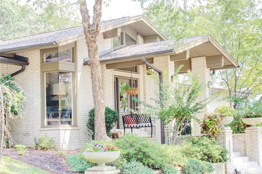 Modern, open, sprawling Fay Jones-inspired home on great lot in Summersby. Open living/dining/kitchen/lounge areas, soaring ceilings, hardwood floors, and split floor plan. Huge owners’ suite featuring dual closets w/built-ins (one 20 ft long), large office for 2 desks, private deck, and bath w/dual head shower and large jacuzzi. Guest suite w/private bath and 2 other bedrooms connected by bath. Kitchen w/marble counters, wine fridge, gas cooktop, venthood, produce sink, walk-in pantry, and wall oven. Built-ins and closets everywhere. Wet bar, gas fireplace, Anderson windows, main floor laundry, Sonos sound system, Rachio irrigation, and 3 HVAC systems w/Nest thermostats. 

Large screened porch w/fans and TV, and even larger deck. 3-car garage w/storage. Huge lower level at grade with large rec room, craft area, cabinets, sink, large half bath, safe room, storage room, and large in/home gym w/walkout. New roof and gutters. Fenced yard w/irrigation. 

Unique and special home designed for entertaining and living!