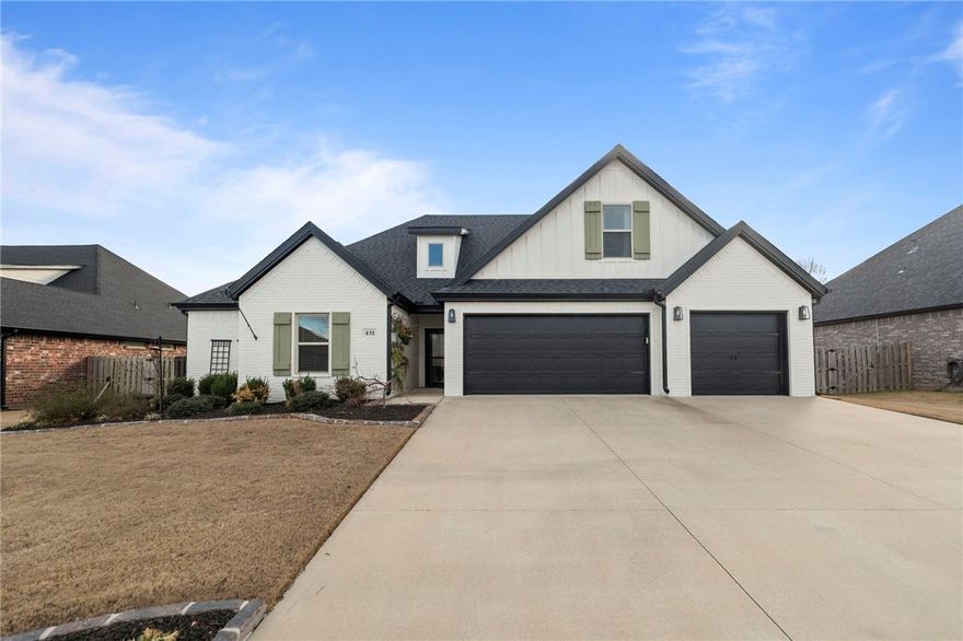 This beautiful 5 bedroom, 3 bathroom home with 3-car garage has 2500 SF. Big open kitchen & living area. Fabulous kitchen, big bar with seating, granite counters with lots of area for prep, cooking & baking, huge pantry, gas countertop range, built in wall oven and microwave. Split bedroom floor plan. Owner suite features lovely bathroom w/large closet & access to laundry room. 1st floor has 3 bedrooms & 2 baths. Upstairs has 4th bedroom, full bath & 5th bedroom is very large & could be used as a bonus room. Inviting spacious covered back porch is perfect for some outdoor enjoyment with privacy fenced backyard. Sidewalks throughout the neighborhood with community pool. Location is great for commuting, every direction. East & West on Hwy 412 to North & South on Hwy 112 & I-49 corridor. Easy access & close to everything. Don't miss this one!