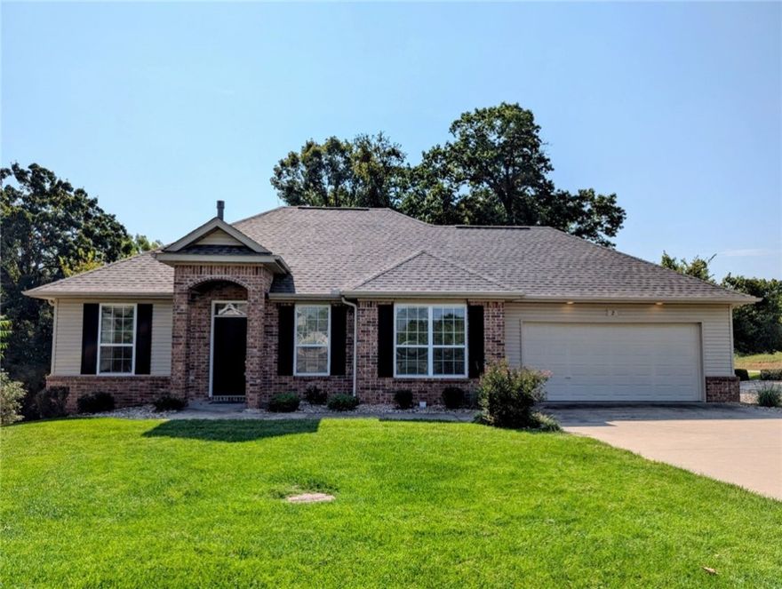 NEW ROOF COMPLETED IN AUG 2025. This beautiful 2-bedroom plus office townhome sits on a corner lot in the highly sought-after Highland Park Villas community. Enjoy peace of mind in this maintenance-free neighborhood. The home features a lovely open layout and a large private deck overlooking a serene, tree-lined rock yard—no mowing or yard work required! Residents also enjoy access to walking trails, a private swimming pool, and a community clubhouse. Perfect for those seeking comfort, security, and convenience in a welcoming neighborhood setting.