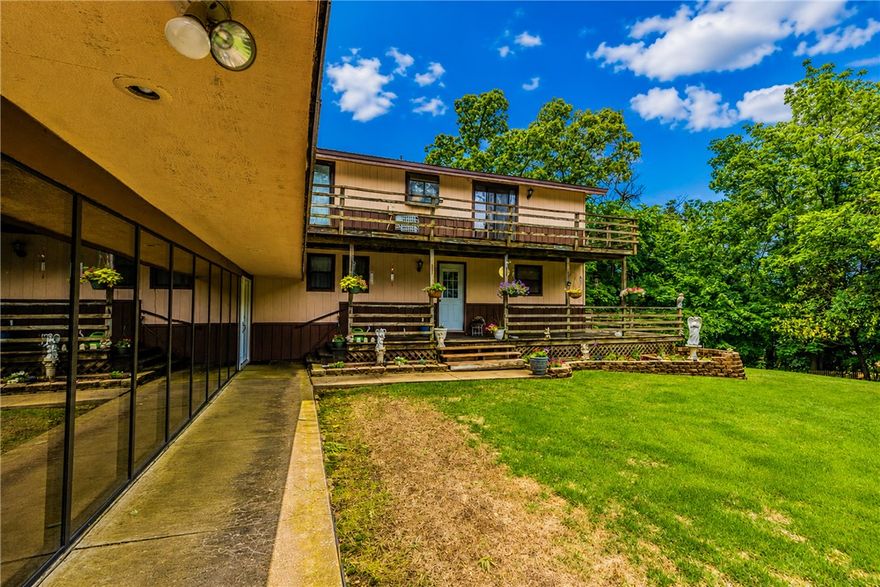 Tucked away on 1.5 beautiful acres in the peaceful countryside of Siloam Springs, this rustic retreat offers the perfect blend of charm, space, and privacy. Featuring 3 bedrooms, 3 bathrooms, and a unique two-level layout, this home is full of warm character and inviting living spaces designed for comfortable country living.

Step outside and enjoy the serene setting complete with a picturesque koi pond, mature landscaping, and a rustic outbuilding perfect for a workshop, hobby space, or additional storage. Whether you’re sipping coffee on the porch, entertaining guests, or simply enjoying the quiet surroundings, this property delivers the kind of peaceful lifestyle people keep pretending they can get from a “luxury apartment community.”

If you’ve been searching for a property with acreage, personality, and room to breathe, this one is a rare find. Property Sold AS IS. Add your own charm and creativity and make it HOME