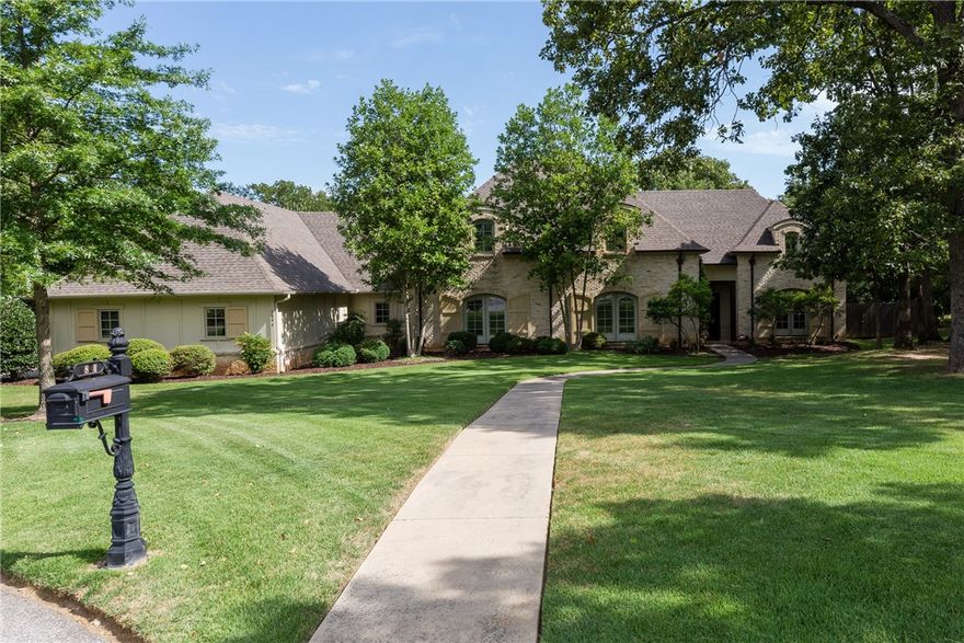 This home is nothing short of spectacular!  Home was originally going to be the custom home of a local builder. 5 bedroom with 4.5 baths all on a stunning 1 acre end of cul de sac lot. Almost entire downstairs has real scraped hardwood floors.  2 bedrooms down with 3 upstairs. Oversized 3 car garage. Nuvo stereo system. Fossilized marble counters in Master Bath