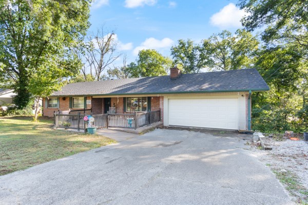 Welcome to 1660 Conrad. This spacious 6-bed, 4-bath home offers the perfect blend of comfort & style, nestled on a generous .41-acre lot. As you approach the property, you'll be greeted by a large, partially covered front porch. Step inside to discover an open floor plan, highlighted by a cozy living room with a charming fireplace. The adjacent dining area offers ample space for meals & entertaining. The kitchen is designed for functionality with abundant cabinet storage and an eat-in area. Double doors lead to a large covered deck, offering even more space to relax or entertain, with a storage shed & a private, fenced-in backyard perfect for pets or kids. Located in the heart of Pea Ridge, this home provides the best of both worlds, quiet neighborhood living with easy access to local amenities.
