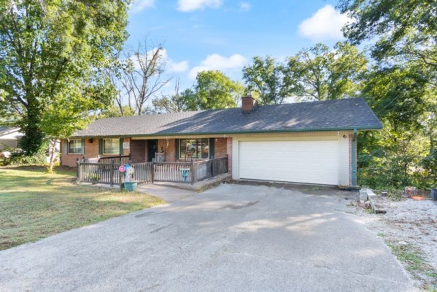 Welcome to 1660 Conrad. This spacious 6-bed, 4-bath home offers the perfect blend of comfort & style, nestled on a generous .41-acre lot. As you approach the property, you'll be greeted by a large, partially covered front porch. Step inside to discover an open floor plan, highlighted by a cozy living room with a charming fireplace. The adjacent dining area offers ample space for meals & entertaining. The kitchen is designed for functionality with abundant cabinet storage and an eat-in area. Double doors lead to a large covered deck, offering even more space to relax or entertain, with a storage shed & a private, fenced-in backyard perfect for pets or kids. Located in the heart of Pea Ridge, this home provides the best of both worlds, quiet neighborhood living with easy access to local amenities.