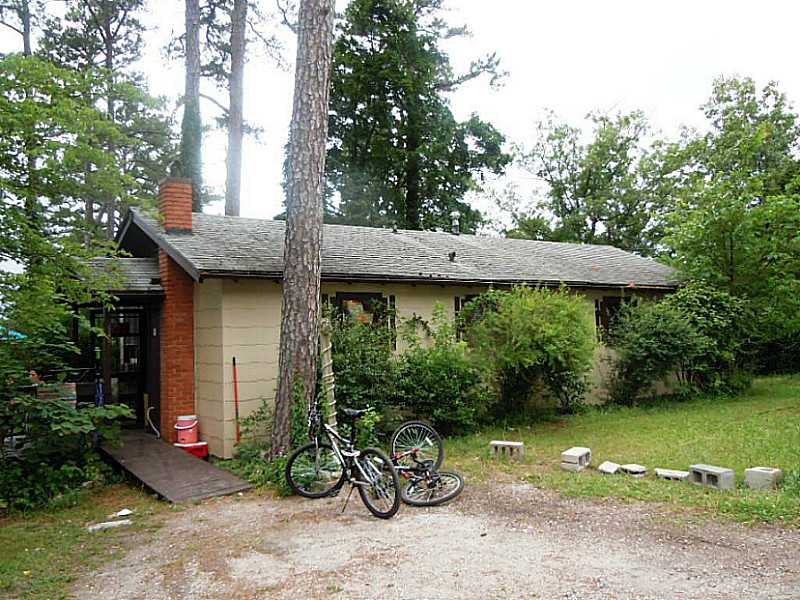 REDUCED!!!!!!! Investment Opportunity. Cash flow with 3 rental properties on 3 acres. Cute cottage and 2 Mobiles large 24 X 50 Workshop/Garage. 250 ft. of Hwy frontage for Commercial potential with 10 x 16 Sales office. Could subdivide into 3 parcels.,LOCATED JUST OUTSIDE THE CITY LIMITS! UNRESTRICTED!!!