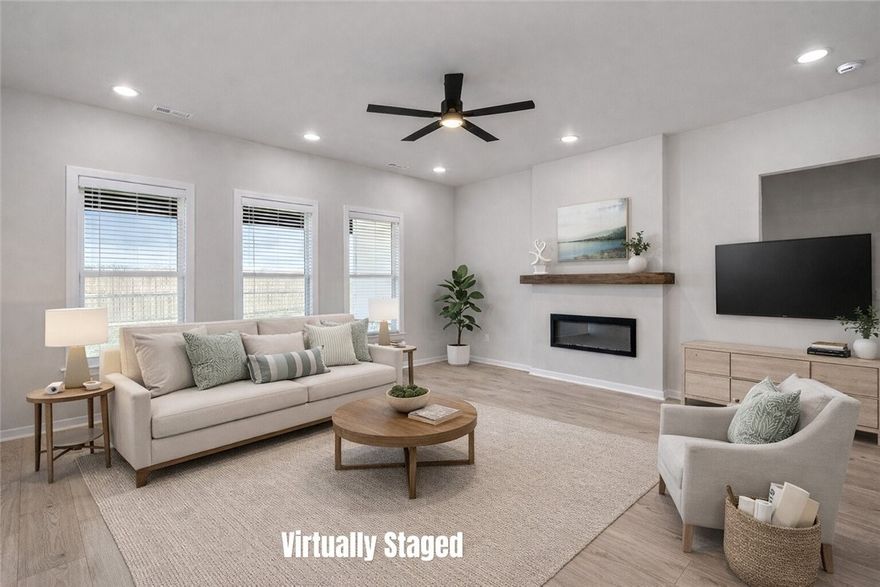 Now for rent in Osage Hills! This one-level, north-facing home features 10-ft ceilings, LVP flooring in main areas and primary suite, and a bright open layout with linear electric fireplace. Chef’s kitchen offers quartz counters, large island, pantry, Frigidaire stainless appliances, and gas range. Spacious primary suite with double sinks, walk-in shower, and large closet. Covered patio overlooks fully fenced, sodded yard. Blinds and gutters included.