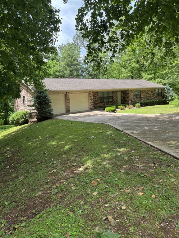 This home sets in a well established subdivision of Speer Heights. Excellent curb appeal with potential. This four bedroom home has a partially finished basement with ample storage. Home does sit on two lots close to all of the town amenities to include the new Creekside Recreational facility. The sunroom is enclosed by glass offering lots of relaxation and quiet moments. Don't miss this one.