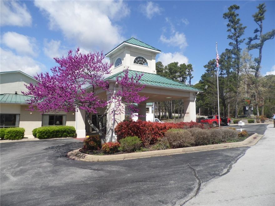 One of the finest lodging facilities in Eureka Springs; and only one with an indoor pool.  The pool and hot tub area backs up to the elevator with soaring ceiling to the 3rd level.  Beautifully appointed and spacious lobby and office area, with breakfast area, and meeting room.  81 rooms, 65 double King rooms, including two suites, and 16 King rooms.   Subject to REO. No financial information available. No property disclosure available. Agent on Board of Directors and stockholder Bank. Historic District