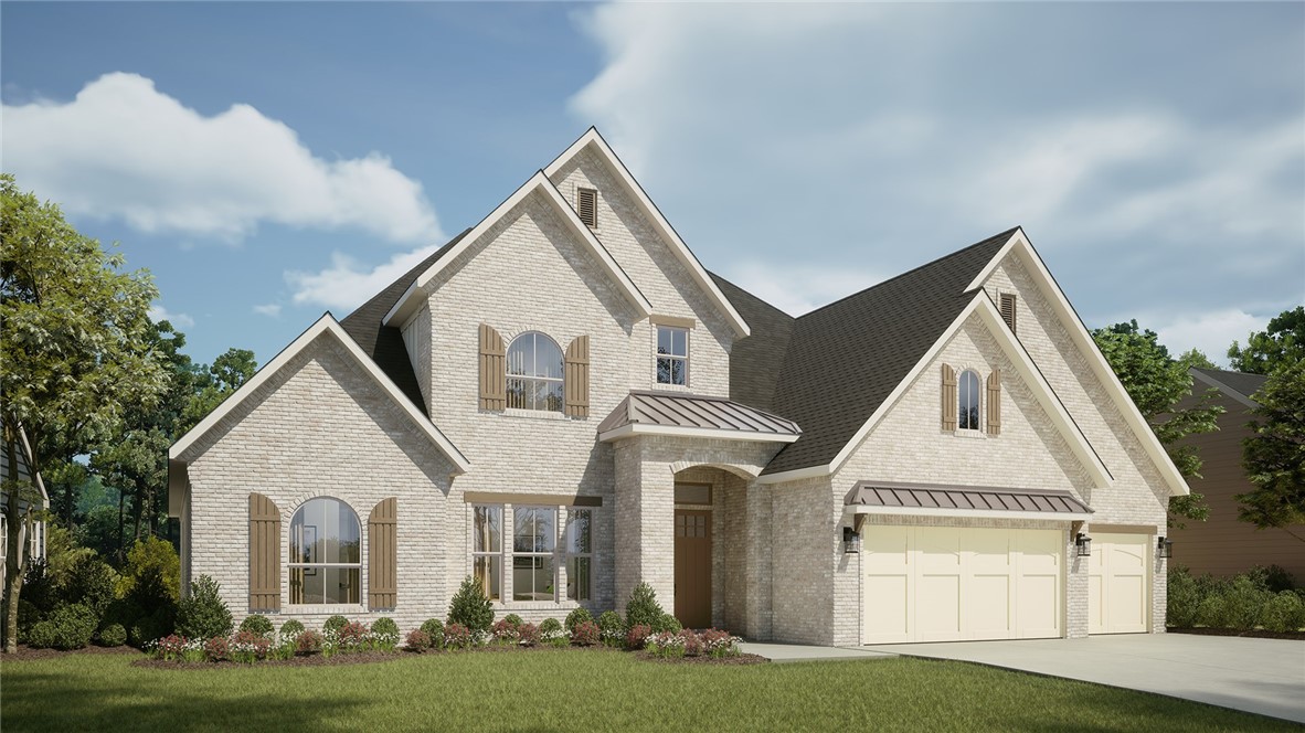This is an Anniston "C" To-Be-Built Home. Custom Cabinets with Stainless Appliances and Quartz Countertops.