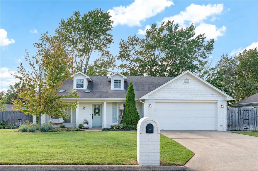 Beautifully updated east-facing Rogers home in Whispering Timbers—move-in ready and full of natural light! This seamless flow layout features skylights, an open-concept living and dining area – perfect for entertaining - and a renovated kitchen with sleek countertops, stainless steel appliances, and a spacious pantry. The private, fenced backyard is a gardener or hobbyist’s paradise with mature trees, lush landscaping, and a newer storage shed. Enjoy relaxed outdoor living on the large covered porch. Located in a quiet, established neighborhood just minutes from Pinnacle Hills, the Walmart Home Office campus, the Walmart AMP, and Downtown Bentonville, with quick access to I-49, parks, and top-rated schools.
