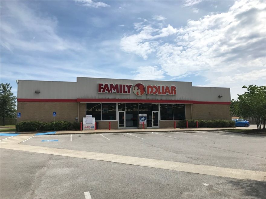 Outstanding commercial location zoned C-2 with unlimited potential. Property is located just half a mile from I-49 Exit 73 and .85 miles from Walmart Supercenter with an estimated daily traffic count of 20,000. Building is currently a Family Dollar store and is available 2/1/20.