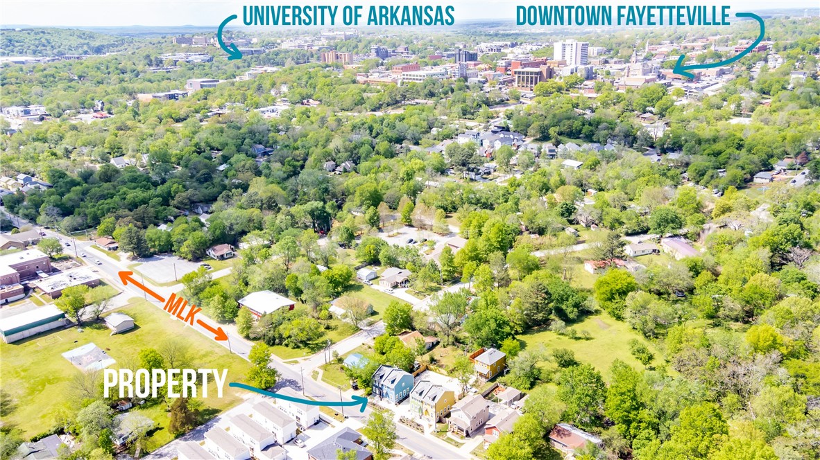 If you're looking for a dream townhome in the heart of Fayetteville, look no further than this stunning 2020 build! This property offers an ideal location, just minutes away from the University of Arkansas and the downtown square, where you can enjoy shopping, dining and entertainment. You'll also love being close to Walker Park and the Razorback Regional Greenway, where you can explore nature and recreation on the 37-mile trail. Inside, you'll find a bright and airy interior with modern finishes throughout. The main level features an open concept design that's perfect for entertaining. The kitchen boasts stainless steel appliances and plenty of counter space. The dining area opens up to your private fenced-in backyard, where you can host guests or relax in the sun. Upstairs, you'll find two spacious bedrooms and two full bathrooms. Plus, you'll have two parking spaces for your convenience. Don't miss out on this amazing opportunity to own a beautiful townhome in Fayetteville!