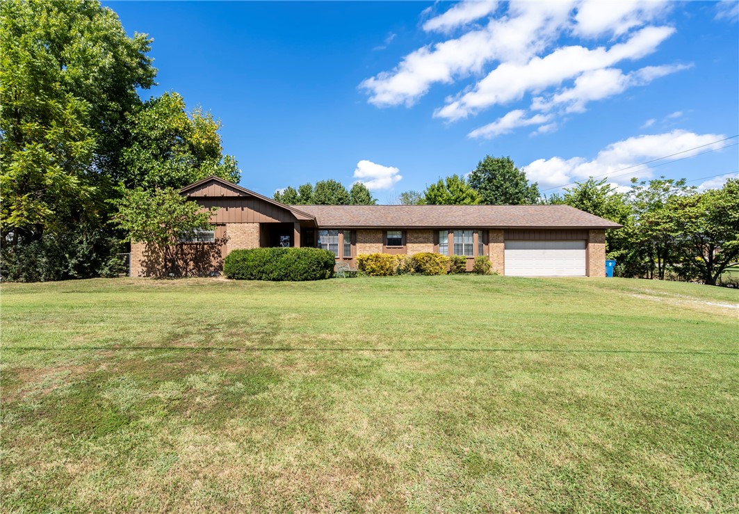 They don't build them like this anymore! 1936 sq ft home with 4 Bedroom 3 bath and flex space for a sitting room or office on .78 of an acre. Solid, well built home that has already seen thoughtful updates, giving it a fresh start while leaving room for your personal touches. Strong construction offers peace of mind and long lasting quality. Ample amount of updates including new 30 yr roof in 2021, new exterior paint in 2024, all new HVAC ductwork underneath house, wood floors, New Onyx master shower, fully updated main bath with heated jet tub, new guest bath shower, and new garage door opener. Outside is a park like setting perfect for entertaining with a fenced back yard, wood deck, fireplace, swings, pergola, fire pit and a custom made garden house. Close to town but in a quiet established neighborhood. A must see!