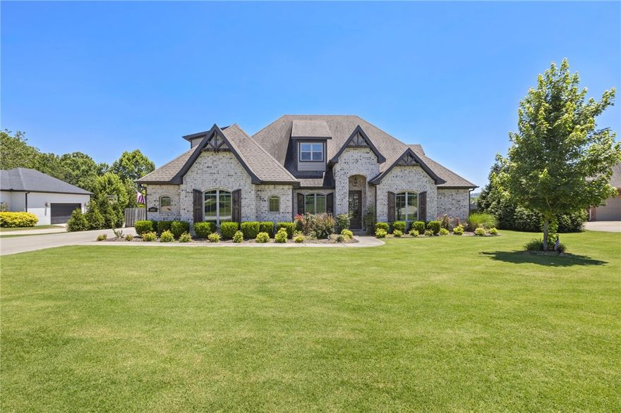 Beautiful home in East Fayetteville's Waterford Estates subdivision! 3,500sqft open concept offers 4 bedrooms and 3.5 bathrooms, living room, formal dining room, office, bonus room upstairs and a large covered patio with built-in grill and fireplace on a 1 acre lot.  Kitchen offers granite countertops, gas cooktop, double ovens, and a breakfast area.  The neighborhood features a clubhouse, community pool, stocked ponds and access to the White River, where you can fish, kayak and swim.