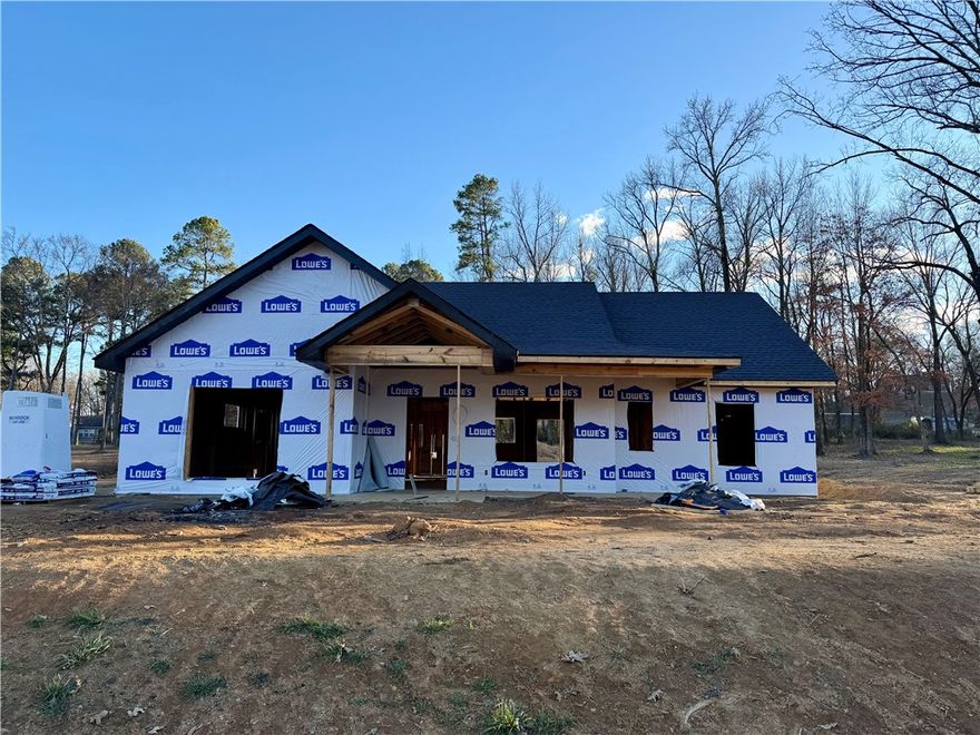 New construction 3-bedroom, 2-bath home offering 1,554 sq ft of living space on 1.5 acres in a quiet, natural setting. This thoughtfully designed home features a functional layout with modern finishes throughout. Enjoy the privacy and space of country living while remaining conveniently close to town. An ideal choice for those seeking new construction with space, privacy, and convenience.