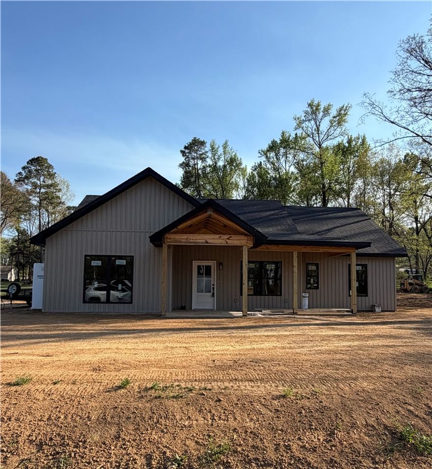 New construction home nearing completion. This 3-bedroom, 2-bath home offering 1,554 sq ft of living space on 1.5 acres in a quiet, natural setting. This thoughtfully designed home features a functional layout with modern finishes throughout. Enjoy the privacy and space of country living while remaining conveniently close to town. An ideal choice for those seeking new construction with space, privacy, and convenience.