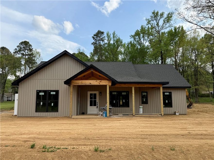 New construction home nearing completion. This 3-bedroom, 2-bath home offering 1,554 sq ft of living space on 1.5 acres in a quiet, natural setting. This thoughtfully designed home features a functional layout with modern finishes throughout. Enjoy the privacy and space of country living while remaining conveniently close to town. An ideal choice for those seeking new construction with space, privacy, and convenience.