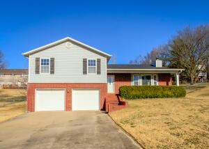Awesome split level home in a great neighborhood! Home features 3 bedrooms (the lower family room could be a 4th bedroom, or a second master, if needed) 3 baths and a great floorplan for your family. When you step into this home you will immediately fall in love with the large living room, with vaulted ceilings, lots of built in shelves and gas log fireplace. The step into the large open ended galley style kitchen with dining area on the end. Master Bed features it's own private deck, and master bath features a large double shower. The home also features fenced back yard, patio, covered porch, and a spacious two car garage. The home has just been freshended up and ready for your family. Check it out!!